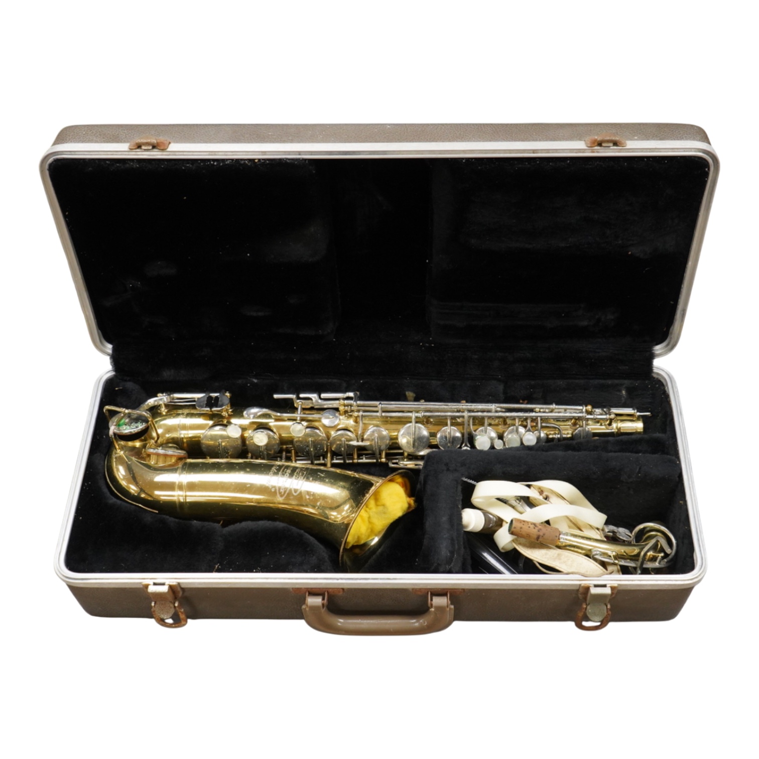 A cased Buesohner Aristocrat alto saxophone